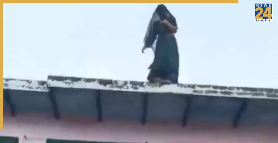 अलीगढ़ में पति के चैलेंज पर महिला ने कूदकर बचाई जान