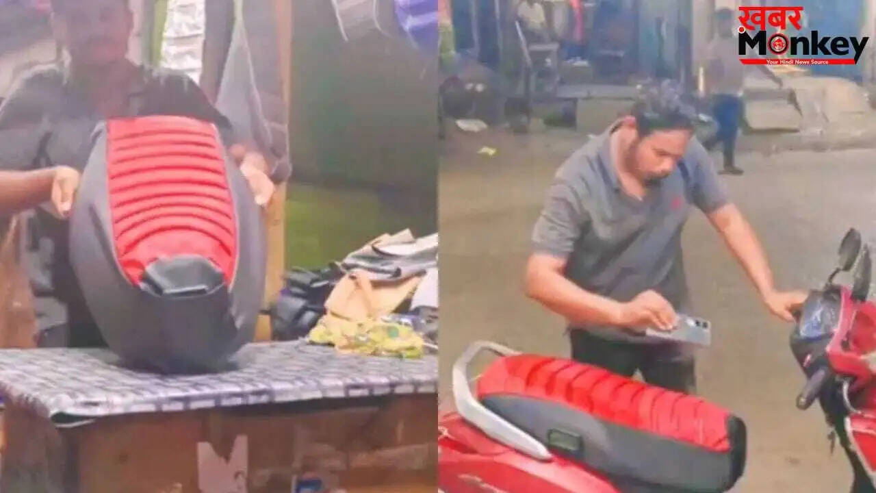 स्कूटी सीट में मोबाइल पॉकेट का अनोखा जुगाड़, सोशल मीडिया पर मचा हंगामा