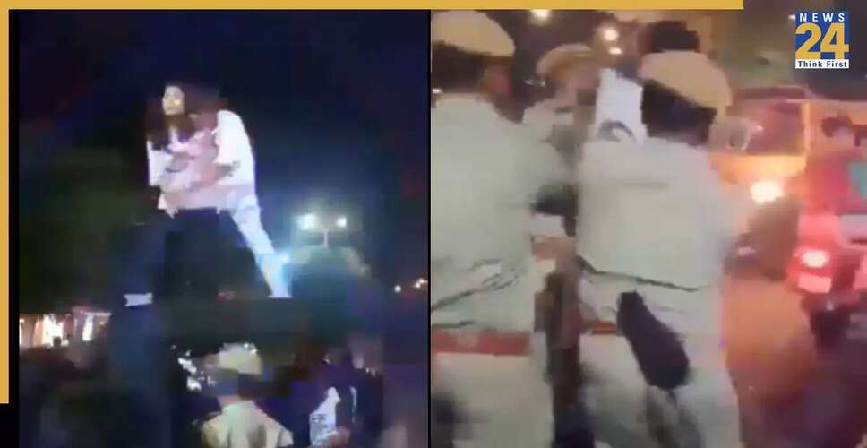 कोटा में पुलिस जीप पर चढ़े प्रेमी जोड़े का वीडियो वायरल