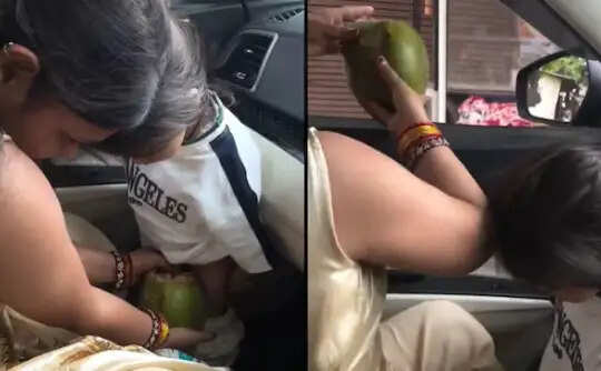 महिला ने कार में बच्चे को नारियल के खोल में पेशाब कराया, वीडियो से मचा हंगामा